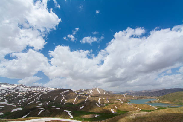 istock Snowy Mountains and cloudy sky and plato 1147179722