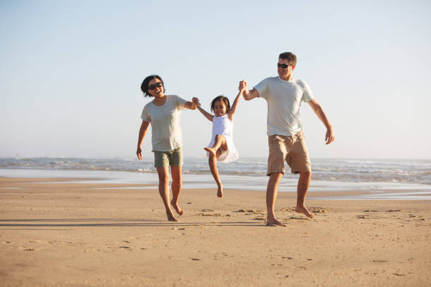 istock Family at the beach 1147180994