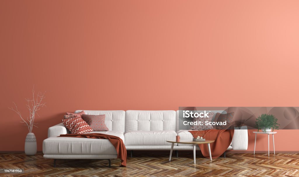Interior of modern living room with white fabric sofa over coral wall 3d rendering Interior of modern living room with white fabric sofa, coffee table and plant over coral wall 3d rendering Home Showcase Interior Stock Photo