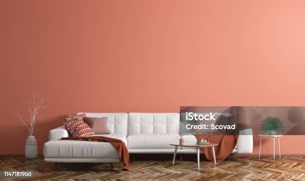 Interior Of Modern Living Room With White Fabric Sofa Over Coral Wall 3d Rendering Stock Photo - Download Image Now