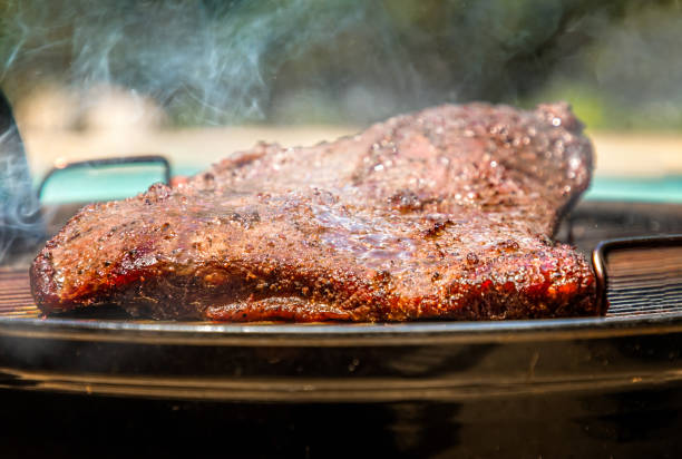 istock Smoked brisket on the bbq grill 1147182109