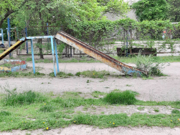 istock Photo old playground. Rusty entertainment equipment. 1147182240
