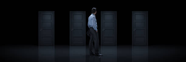 istock Businessman choosing the right door. 3d rendering 1147183627