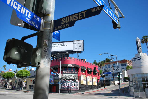 Sunset Boulevard and the Whisky a Go Go (West Hollywood/Los Angeles/California) A street shot of the famous Sunset Boulevard and the legendary rock music nightspot Whisky a Go Go. sunset strip stock pictures, royalty-free photos & images