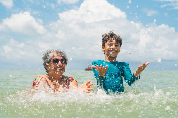 istock Family playing on the beach 1147196418