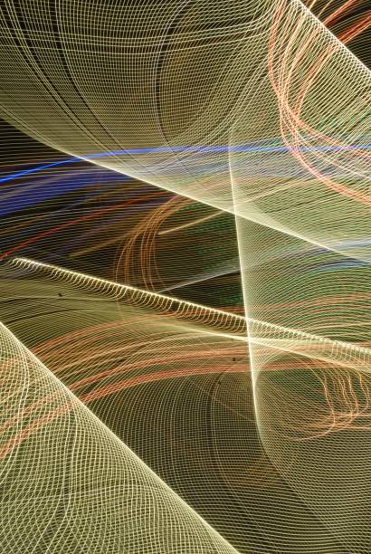 istock Abstract futuristic background color texture with lighting effect. Modern dynamic shiny pattern. Fractal graphic artwork design. Abstract lights at night. Creative long exposure photography 1147196682