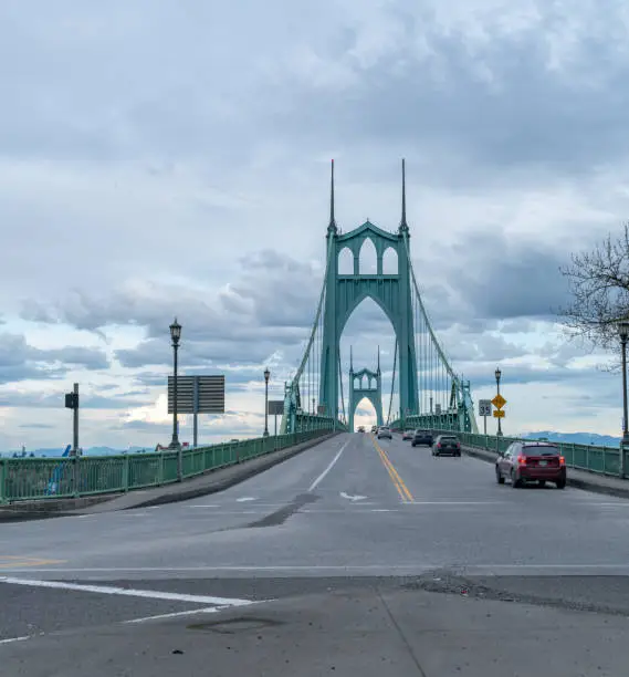 Photo of Looking At the Traffic Lanes of St Johns Bridge with Cloudy skies