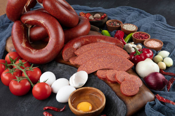 Sausage ( Turkish Sucuk ) concept photo. Turkish cuisine sausage ; eggs, bunch tomato, pepper, onion, with Turkish Sucuk. Sausage ( Turkish Sucuk ) concept photo. Turkish cuisine sausage ; eggs, bunch tomato, pepper, onion, with Turkish Sucuk. turkish sausage stock pictures, royalty-free photos & images