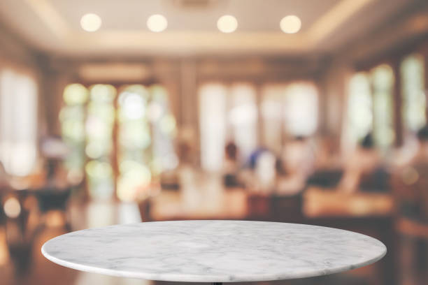 istock round marble table top with cafe restaurant bokeh lights abstract background for montage product display 1147210109