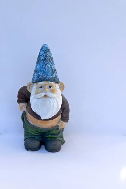 istock Garden Gnome with slipping pants and bare belly.  Isolated on white background. (not protected by copyright) 1147210209