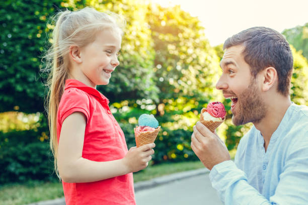 istock Father and daughter walk outdoors family time 1147210282
