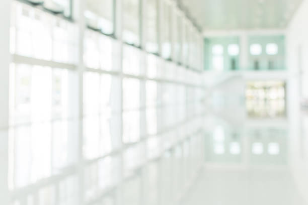 istock Office building blur background business lobby reception hall interior or empty indoor foyer meeting room with blurry light from glass wall window 1147221010