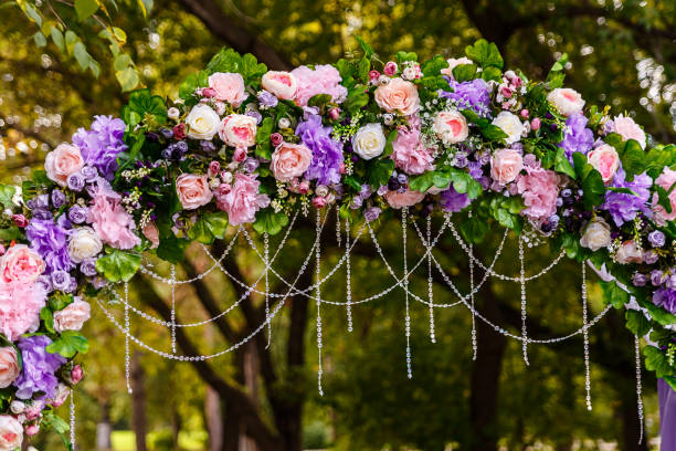 istock Arch decorated with lilac flowers 1147229840