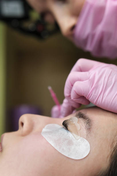istock Eyelash Extension Procedure. Woman Eye with Long Eyelashes 1147232457