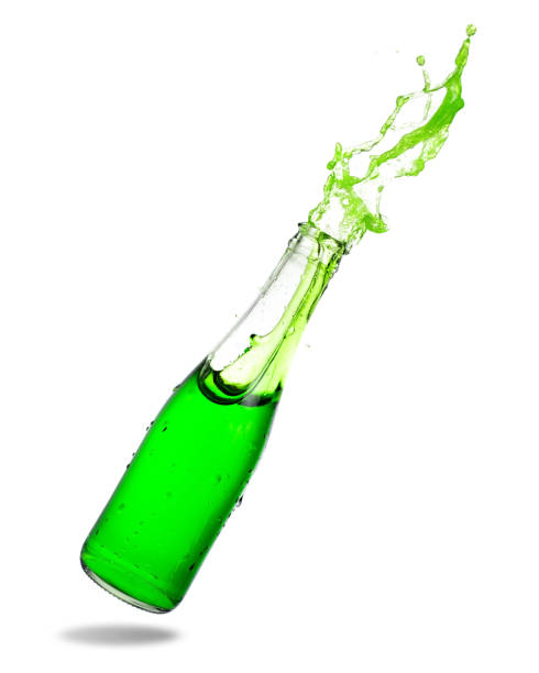 istock Green soda in glass bottle splashing 1147232627