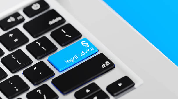 istock Modern Keyboard with Blue Legal Advice Button 1147234296