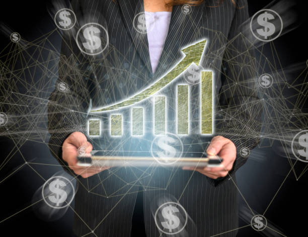 istock Business Graph Concept on Tablet with Hologram 1147236063