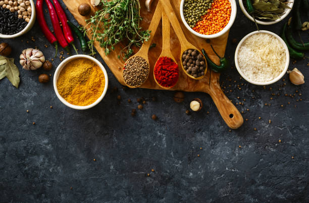 istock Spices herbs rice various beans and seasonings for cooking on dark backgraund with copy space top view 1147236837