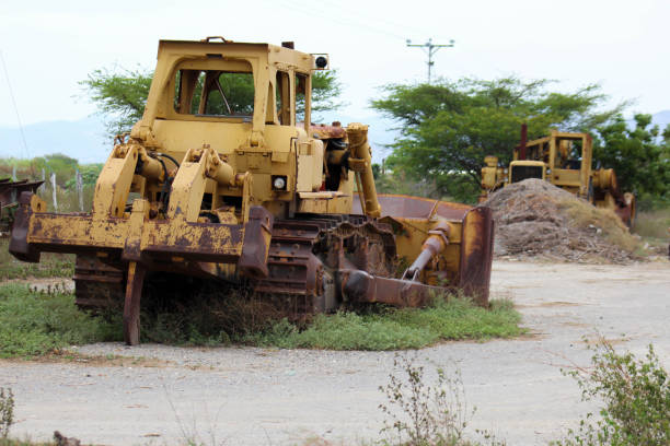 istock Yellow bulldozer abandoned, damaged and rusted 1147237675