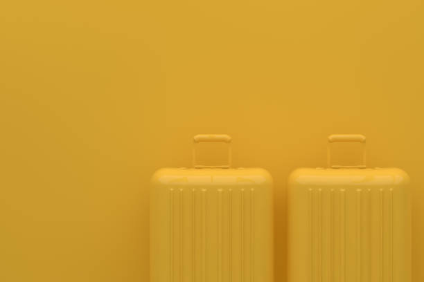istock Suitcase, Minimal Travel Concept, Yellow Colors 1147241788