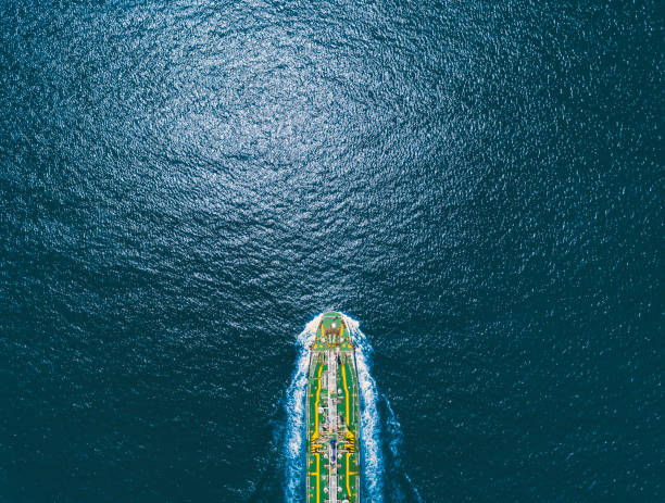 Aerial top view Oil ship tanker on the sea transportation oil from refinery. Aerial top view Oil ship tanker on the sea transportation oil from refinery. gas tank photos stock pictures, royalty-free photos & images