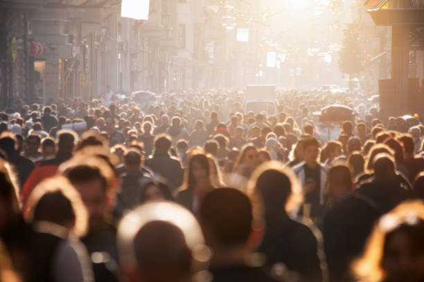 istock Blurred crowd of unrecognizable at the street 1147250191