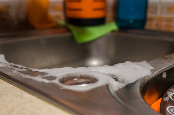 istock sink with dirty dishes 1147254480