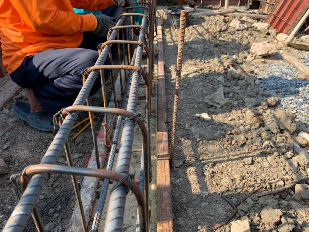 istock Workers are tying iron used for foundations.  In house construction 1147256602