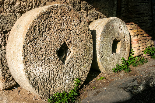 Ancient typical grindstones in San Gimignano, Tuscany