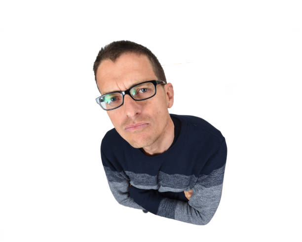 man with arms crossed on white background