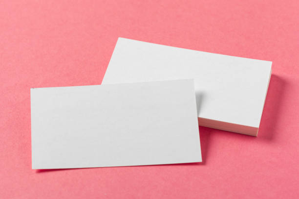 istock Blank paper pieces  on a colored pink background 1147262303