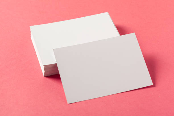 istock Blank paper pieces  on a colored pink background 1147262618