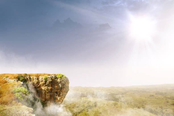 The edge of cliff with landscapes and sunlight background