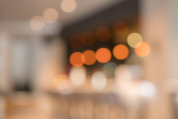 istock Blurry image of a cafe interrior background with bokeh 1147266396