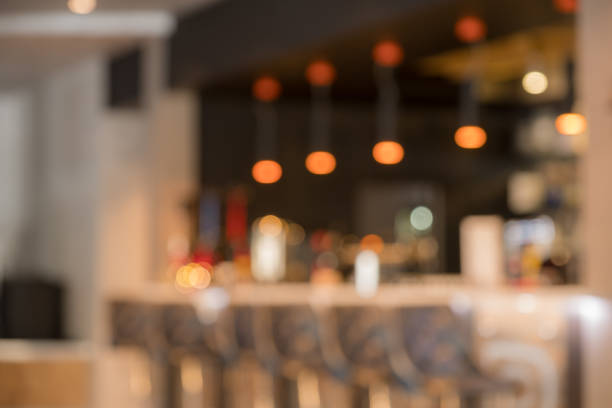 istock Blurry image of a cafe interrior background with bokeh 1147266452
