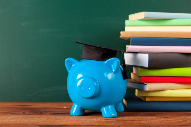 Study theme with pink piggy bank with chalkboard