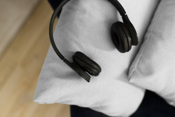 istock headphone lying on pillow for listening relax music 1147268714