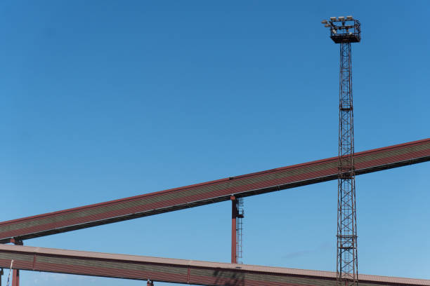 istock Low Angle View Of Construction Machinery Against Clear Blue Sky 1147268967