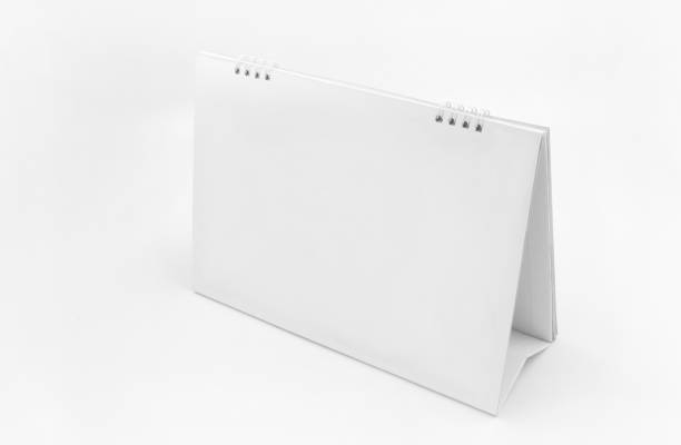 istock High Angle View Of Empty Calendar Over White Background 1147269577