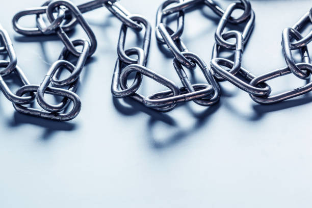 istock Detailed closeup lots of silver chains 1147271844