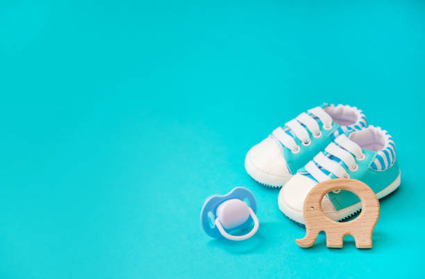 istock baby accessories for newborns on a colored background. selective focus. 1147275589