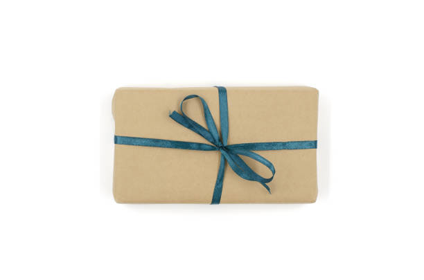 istock Kraft gift box with blue ribbon is on a white background 1147275634