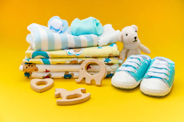 istock baby accessories for newborns on a colored background. selective focus. 1147275641