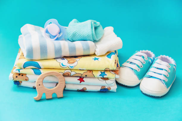 istock baby accessories for newborns on a colored background. selective focus. 1147275681