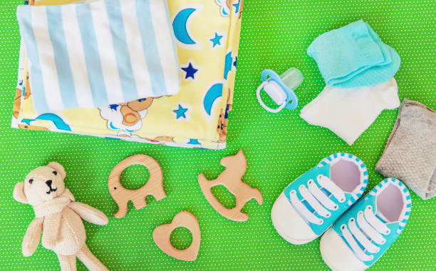 istock baby accessories for newborns on a colored background. selective focus. 1147275691