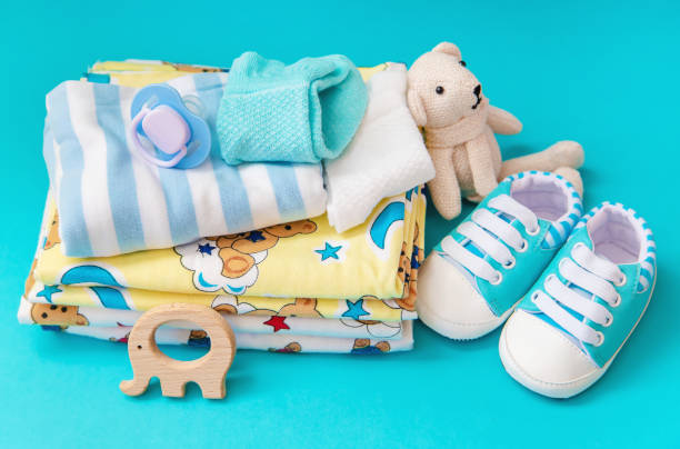 istock baby accessories for newborns on a colored background. selective focus. 1147275715