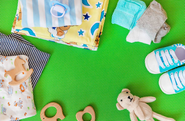 istock baby accessories for newborns on a colored background. selective focus. 1147275731