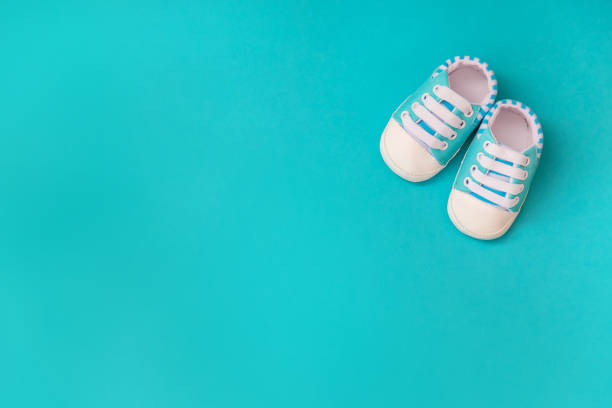 istock baby accessories for newborns on a colored background. selective focus. 1147275789