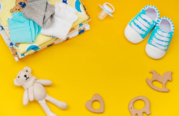 istock baby accessories for newborns on a colored background. selective focus. 1147275793