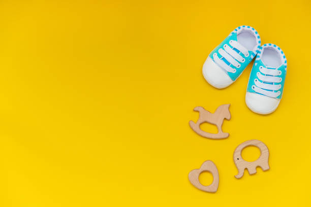 istock baby accessories for newborns on a colored background. selective focus. 1147275805